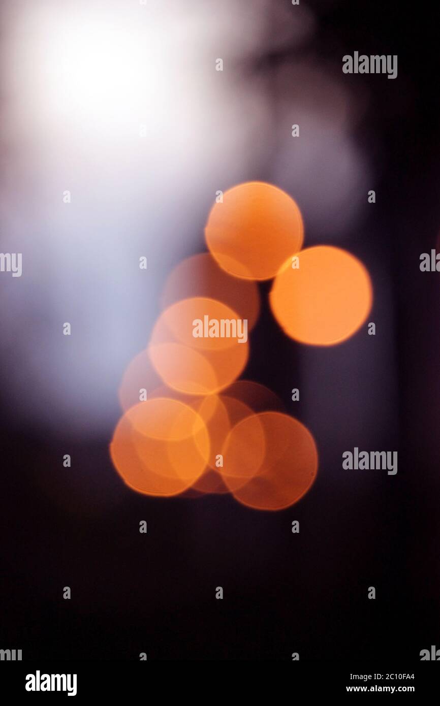 several orange bokeh with blurred circles Stock Photo