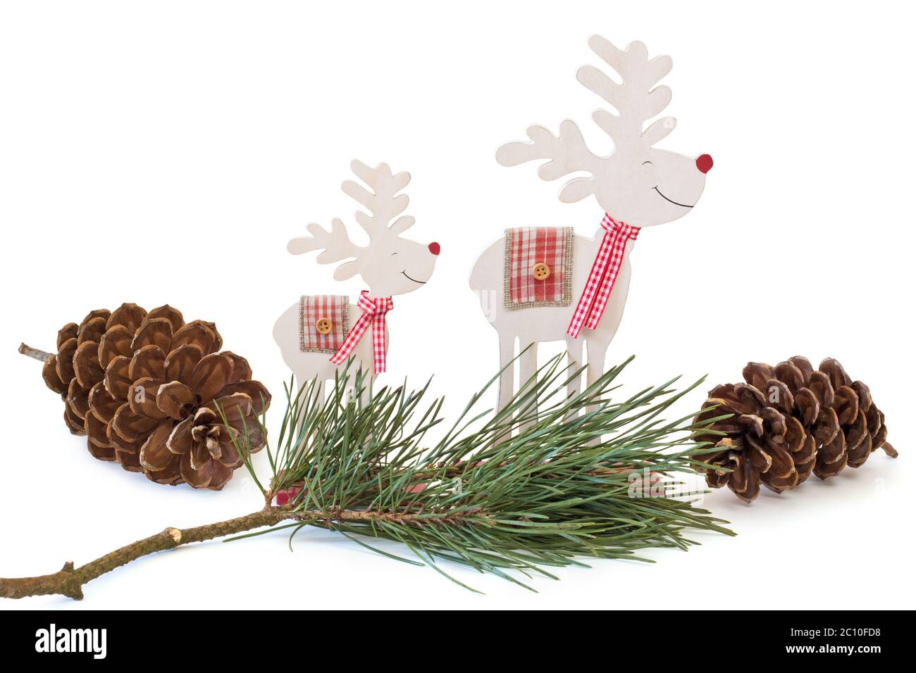 Reindeer with pine branch Stock Photo