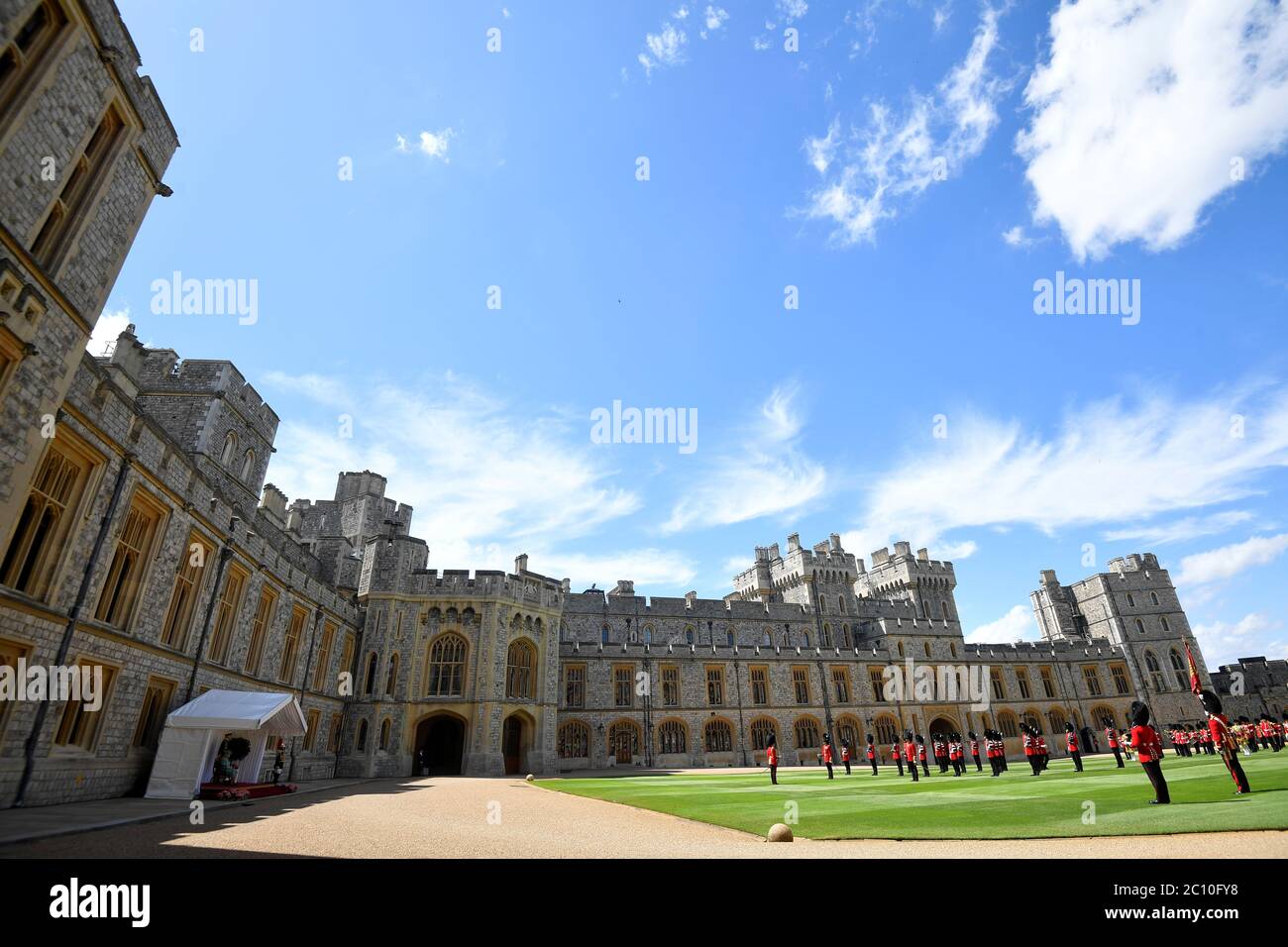 Guardsmen keep social distance as they stand in formation for a ceremony at Windsor Castle to mark the official birthday of Queen Elizabeth II. Stock Photo