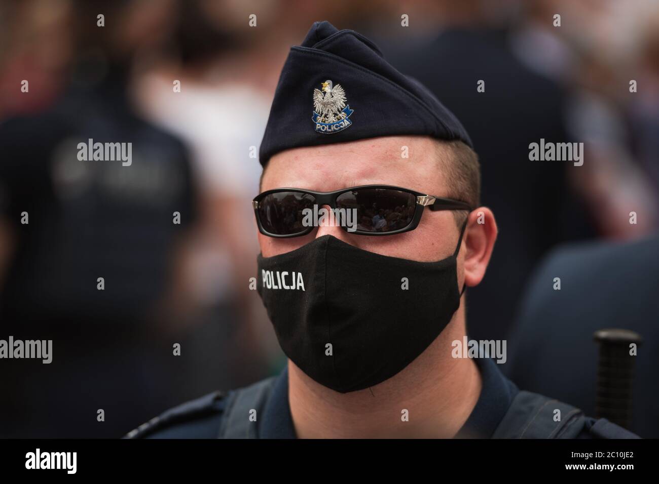 ZLOTORYJA, POLAND - JUNE 12, 2020. Portrait of Policeman during election meeting with President of Poland Andrzej Duda. Stock Photo