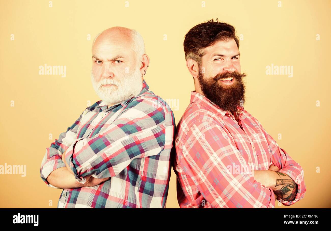 Brutal guys with long beard. Father and son. Hairdresser salon ...