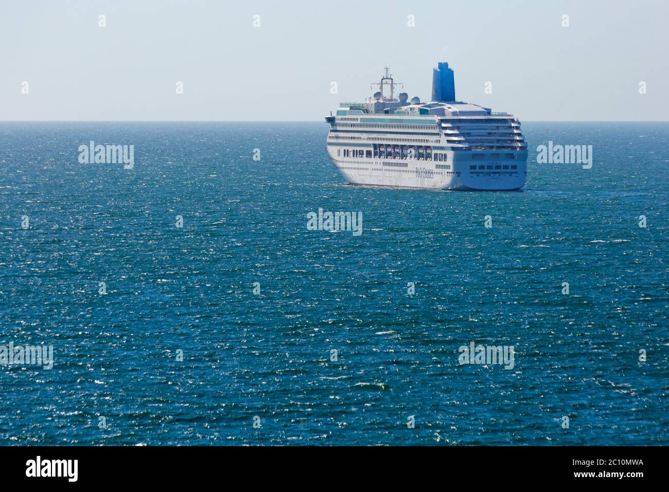 Bournemouth, Dorset UK. 13th June 2020. P&O cruise ship Arcadia joins Aurora moored at Poole Bay, Bournemouth as not enough room at Southampton; they are not cruising due to Coronavirus pandemic closing down the cruising industry forcing the companies to lay up their ships. Viewed from the beach. Credit: Carolyn Jenkins/Alamy Live News Stock Photo