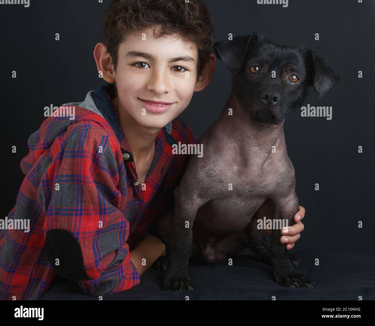 Portrait of Boy and Peruvian Dog Stock Photo