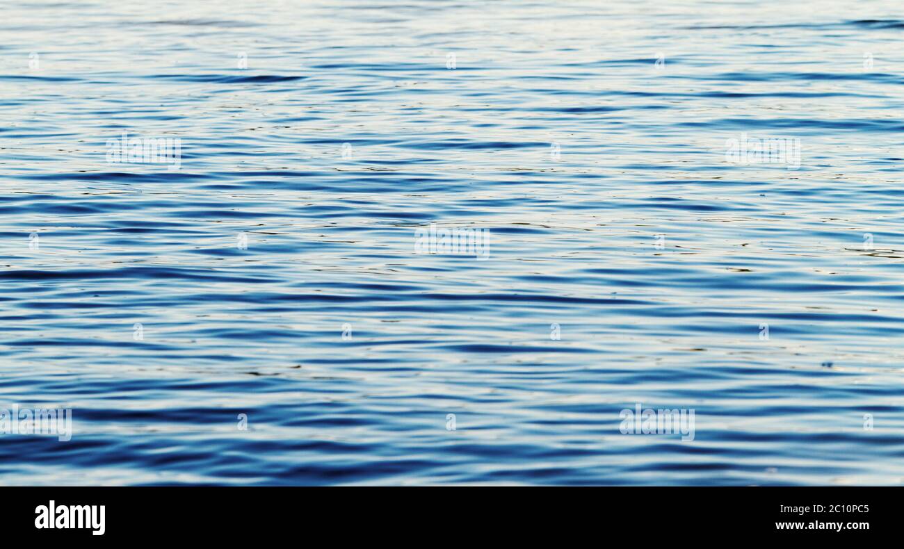 Photo of blue water background with ripples Stock Photo - Alamy