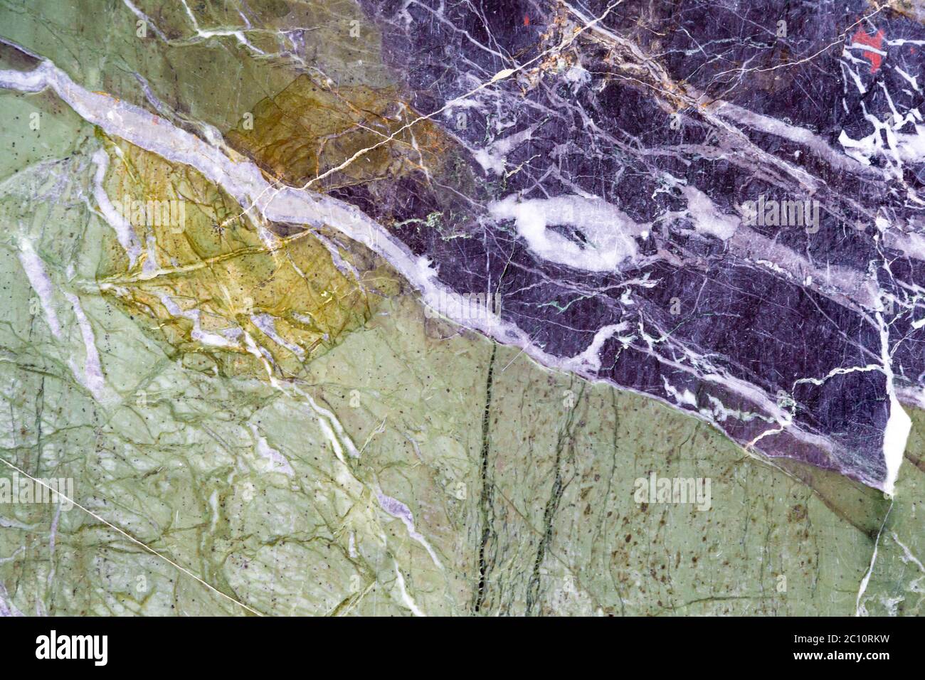 A structure of different stone types as a background Stock Photo - Alamy