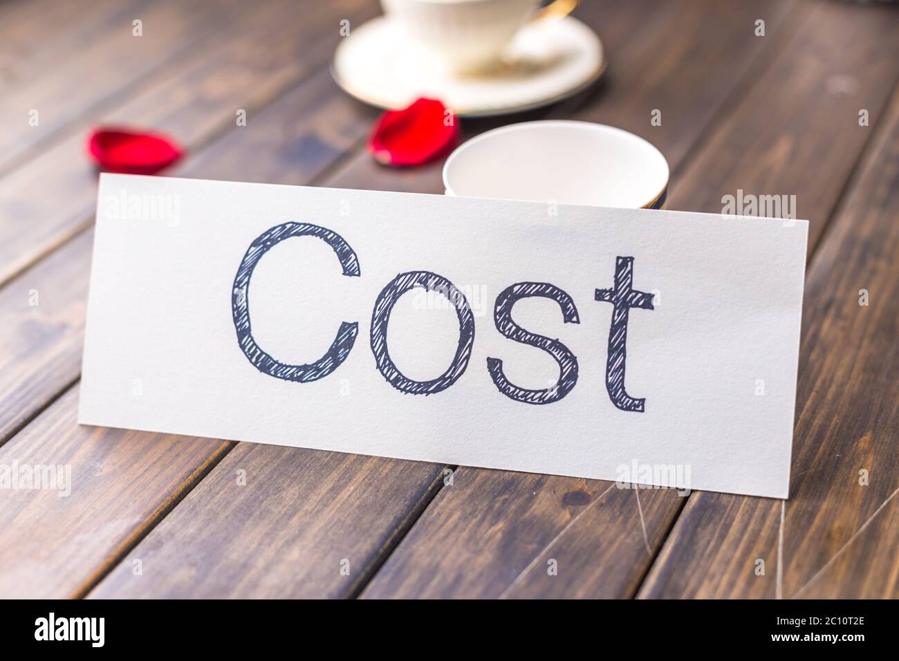 cost on white paper in cafe Stock Photo