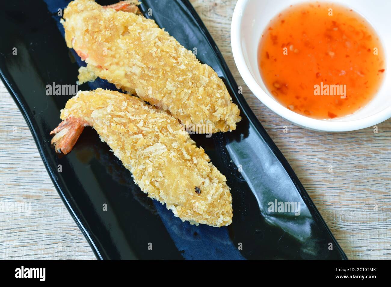 crispy fried shrimp coating flake bread and flour dipping with sweet