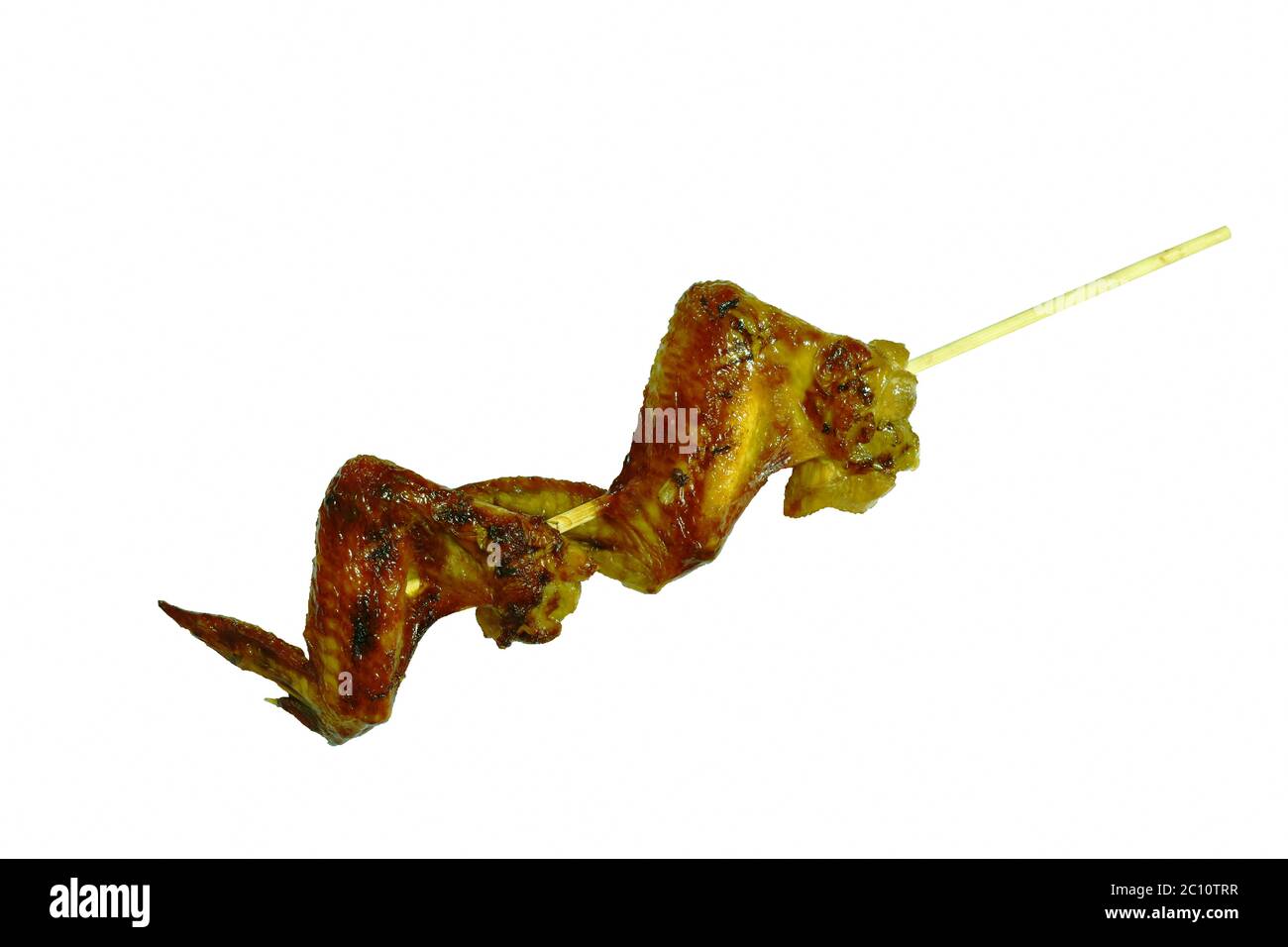 grilled chicken wing stabbing in wooden stick on white background Stock Photo