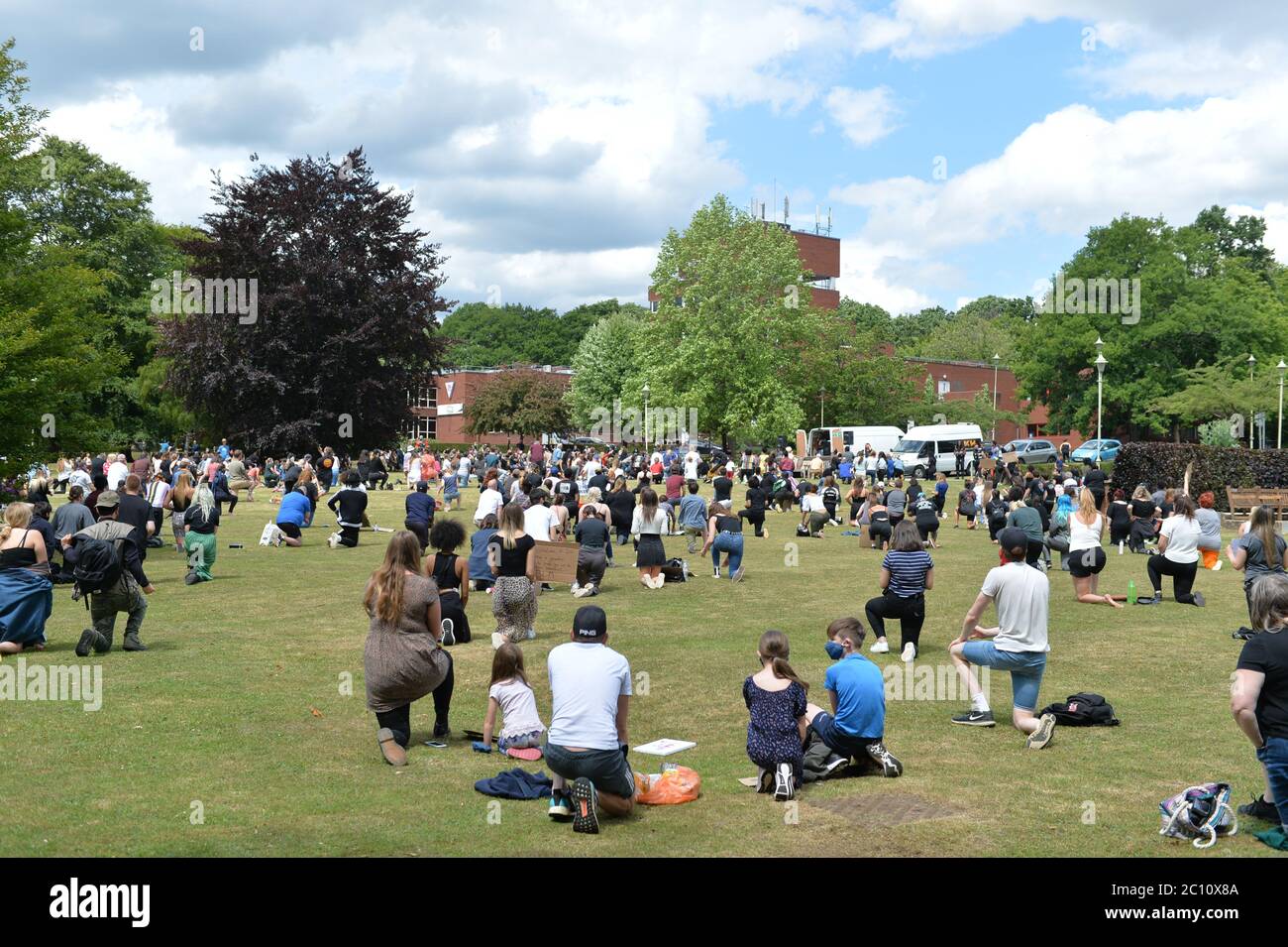 Welwyn Garden City, UK. 13th June, 2020. A black lives matter protest took place on the Campus West Roundabout between the Campus West and Oaklands college in Welwyn Garden City, UK. The protesters gathered to protest peacefully and to take a knee against racism. Protesters were asked to wear PPE and to adhere to social distancing due to the corona virus (Covid-19) pandemic. Credit: Andrew Steven Graham/Alamy Live News Stock Photo