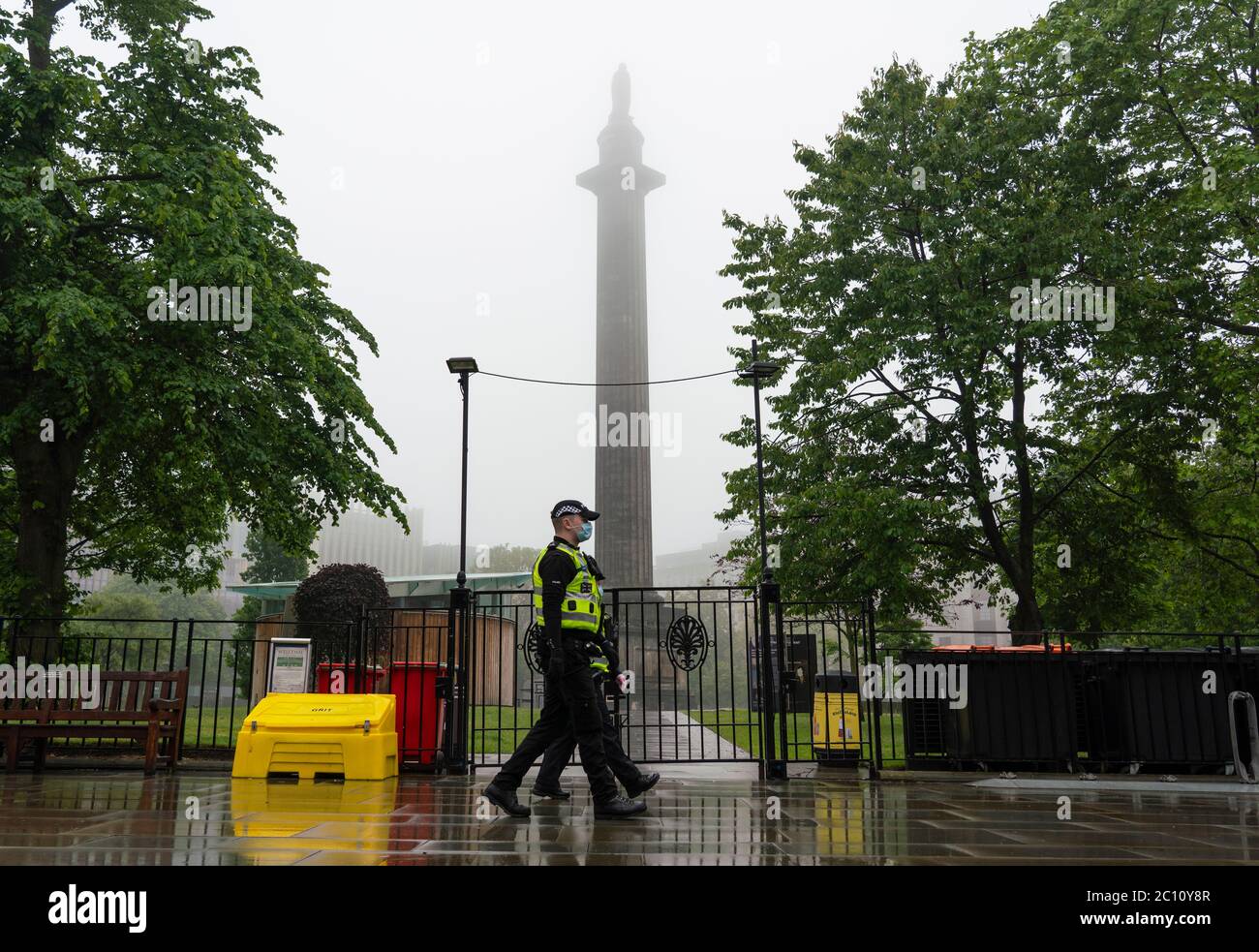 Edinburgh, Scotland, UK. 13 June 2020. Police patrol St Andrew Square on Saturday afternoon. A planned Black Lives Matter demonstration in the square seems to have attracted only a few peaceful protestors. The square is the site of the Melville Monument and statue of Henry Dundas, Protestors want the statue removed. Iain Masterton/Alamy Live News Stock Photo