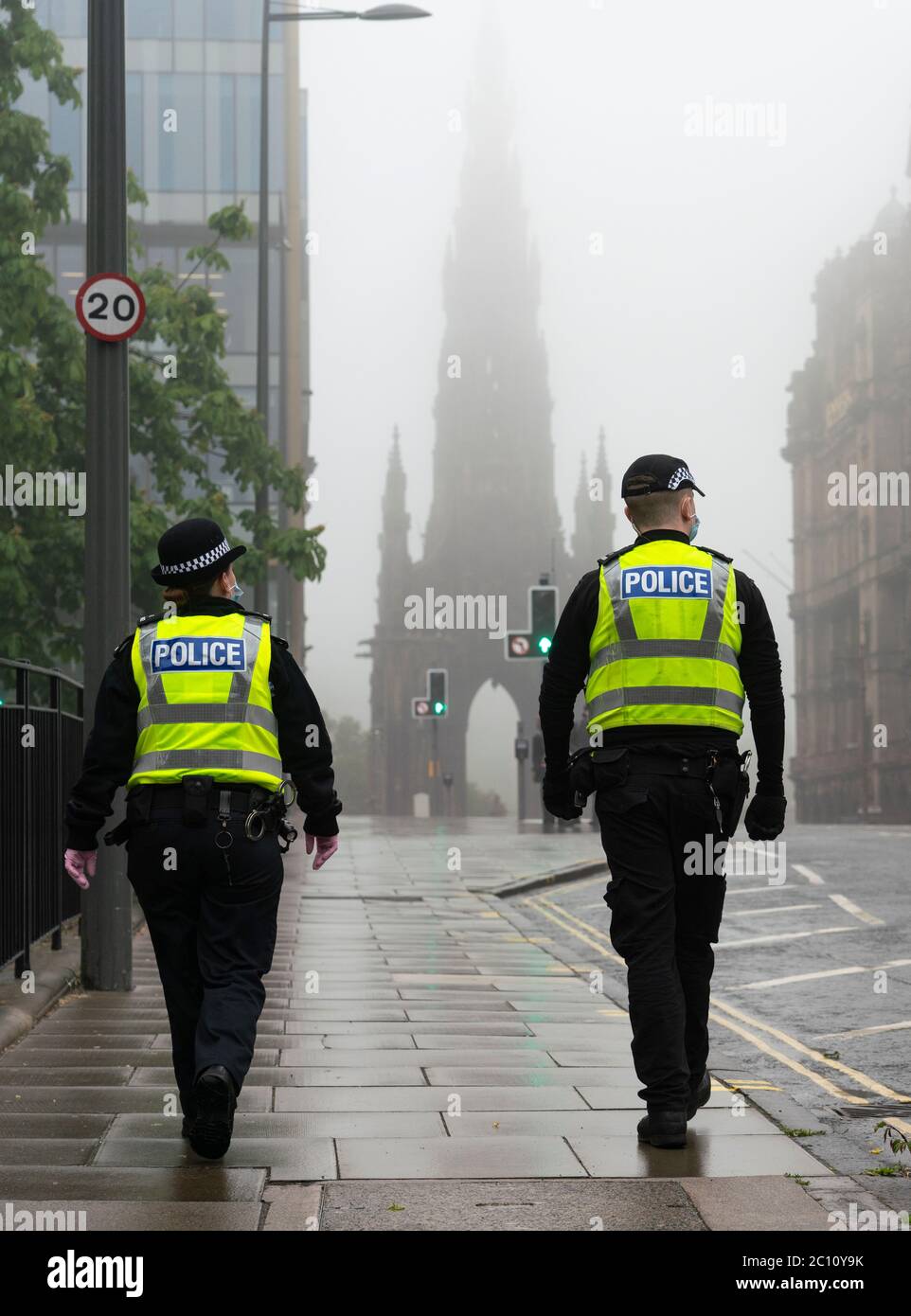 Edinburgh, Scotland, UK. 13 June 2020. Police patrol St Andrew Square on Saturday afternoon. A planned Black Lives Matter demonstration in the square seems to have attracted only a few peaceful protestors. The square is the site of the Melville Monument and statue of Henry Dundas, Protestors want the statue removed. Iain Masterton/Alamy Live News Stock Photo