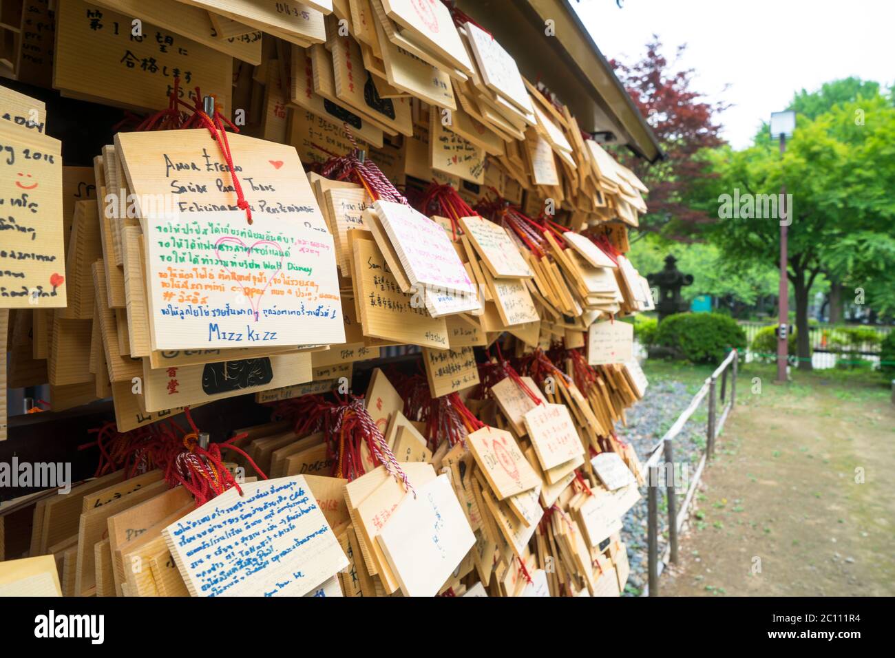 wood plates with good wish hanging in temple in tokyo Stock Photo
