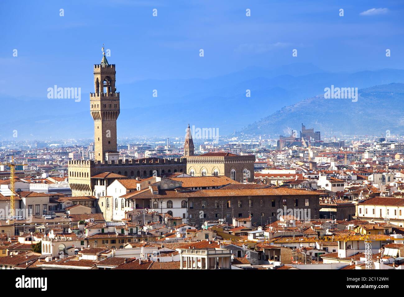 The clock tower of the Old Palace (Palazzo Vecchio) in Signoria Square