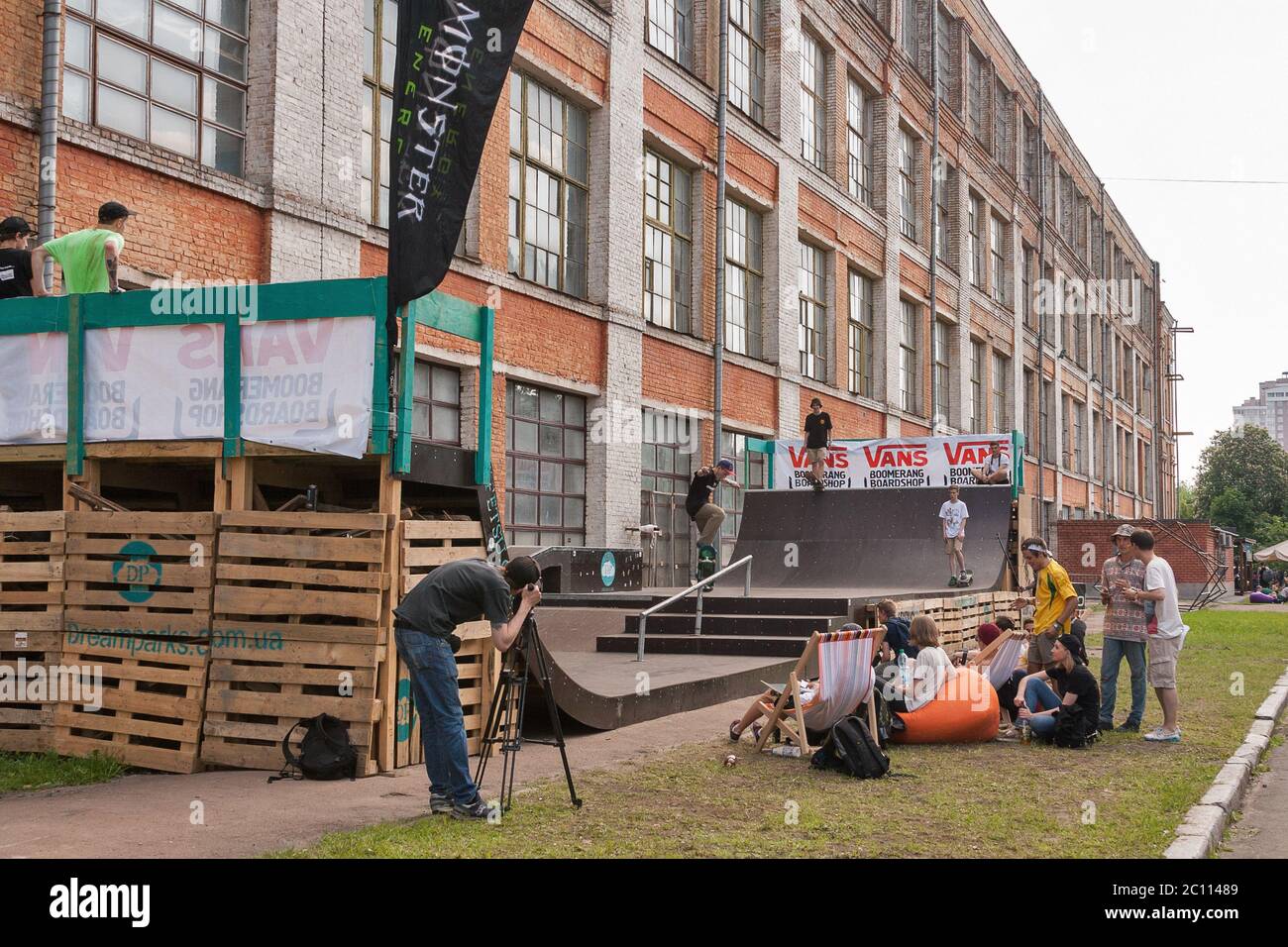 KIEV, UKRAINE - MAY 23, 2015: Sport competition with skateboarders jumping on a ramp at International Tattoo Convention Kyiv Tattoo Collection by Plan Stock Photo