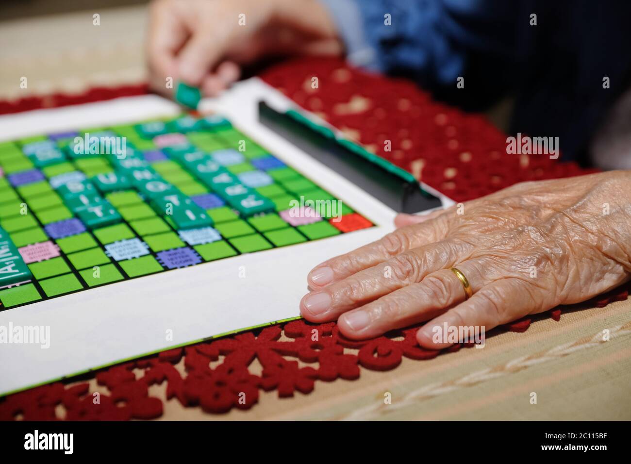 Crosswords for Elderly ,help improve memory & brain Stock Photo