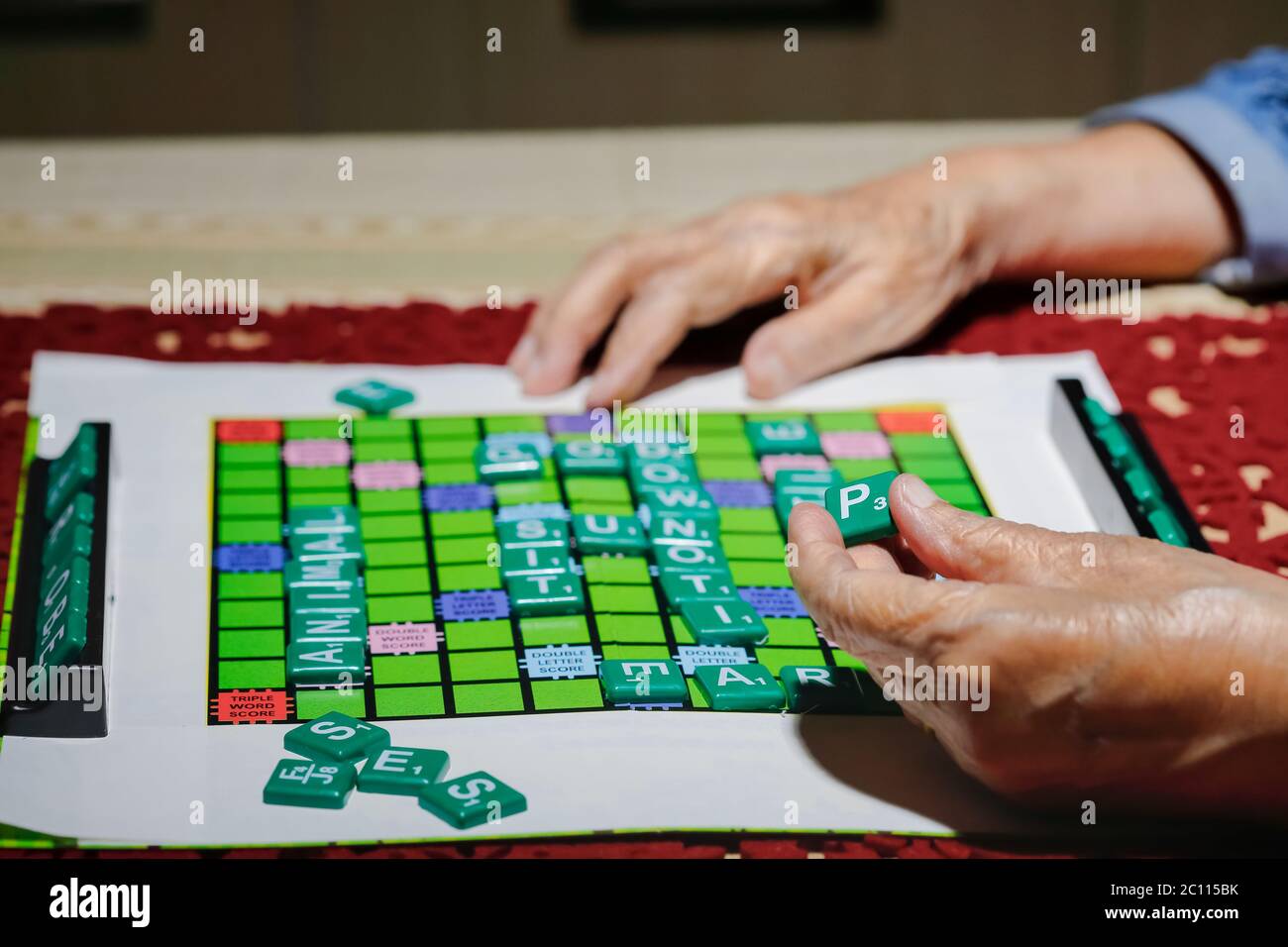 Crosswords for Elderly ,help improve memory & brain Stock Photo