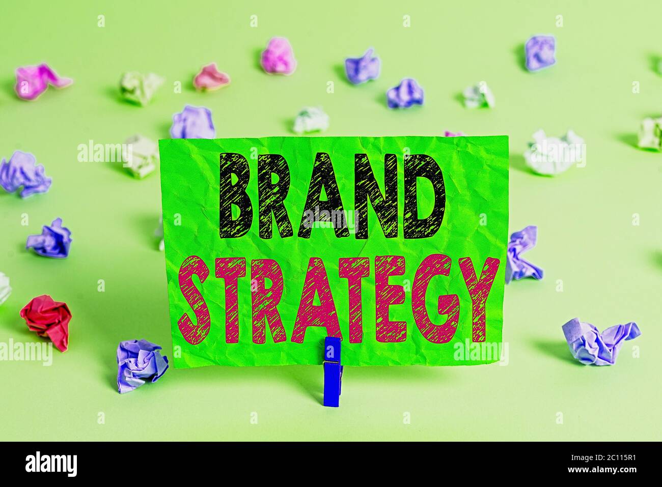 Writing note showing Brand Strategy. Business concept for longterm plan ...