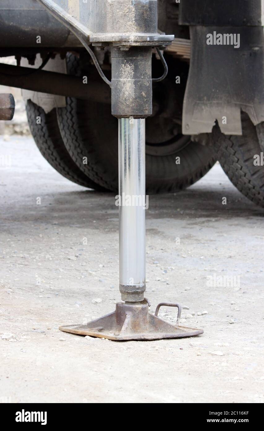 Truck strong outrigger stabilizing legs extended. Working leg from a crane Stock Photo Alamy