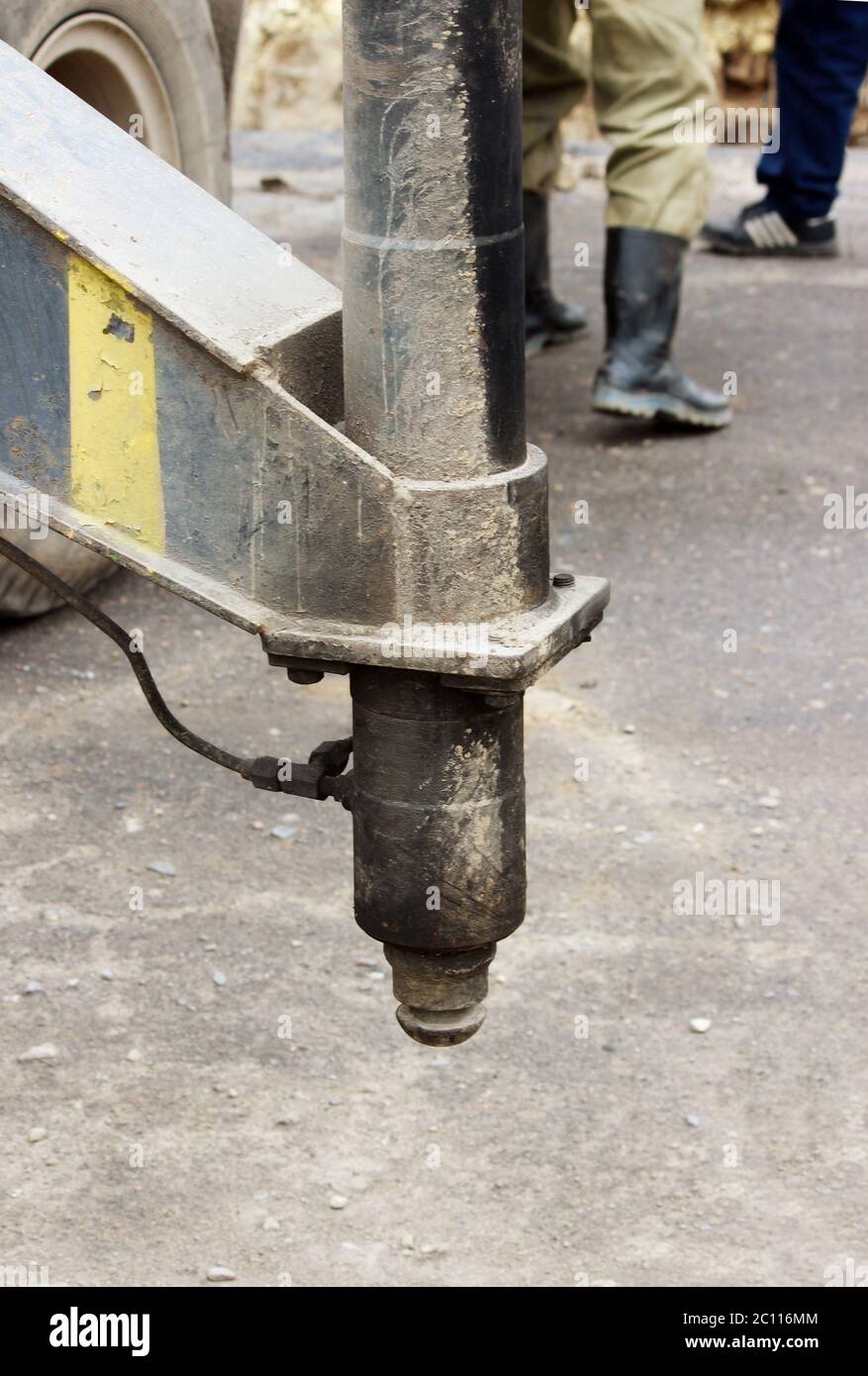 Truck strong outrigger stabilizing legs extended. Working foot of crane during assembly Stock