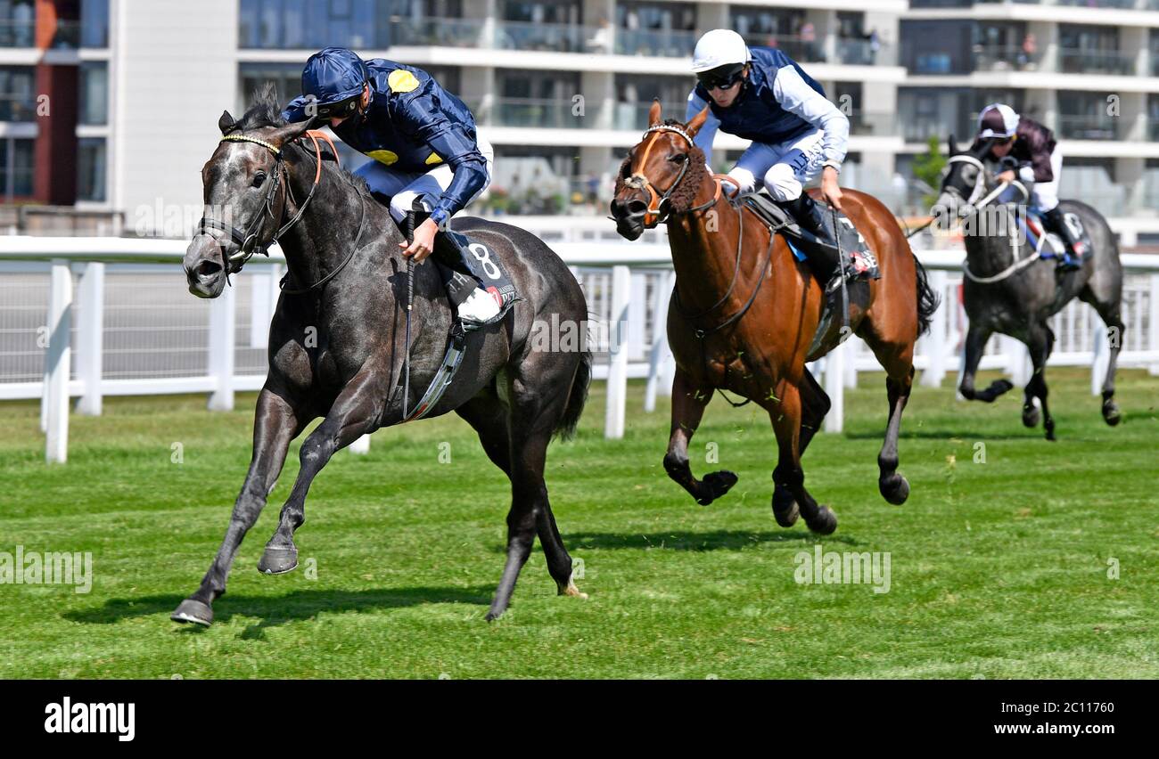 Mubtasimah ridden by James Doyle (left) wins the Watch And Bet With MansionBet At Newbury Maggie Dickson Fillies’ Stakes at Newbury Racecourse. Stock Photo