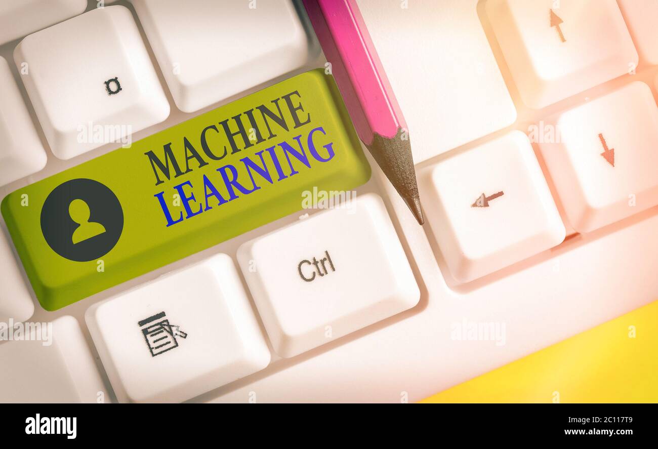Writing Computer Learns Writing note showing Machine Learning. Business concept for the concept ...