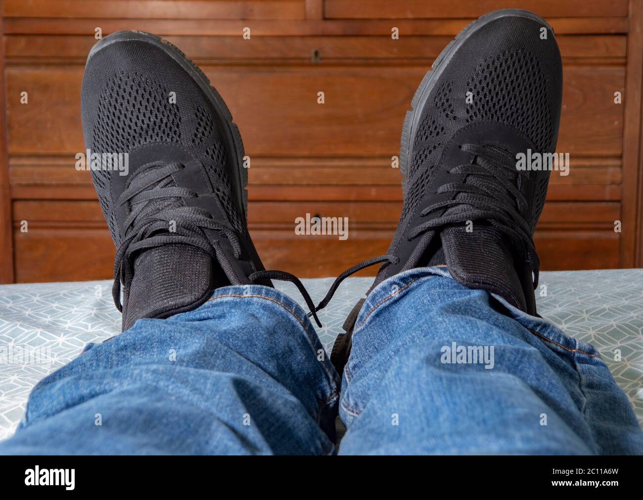 Black trainers with jeans sales