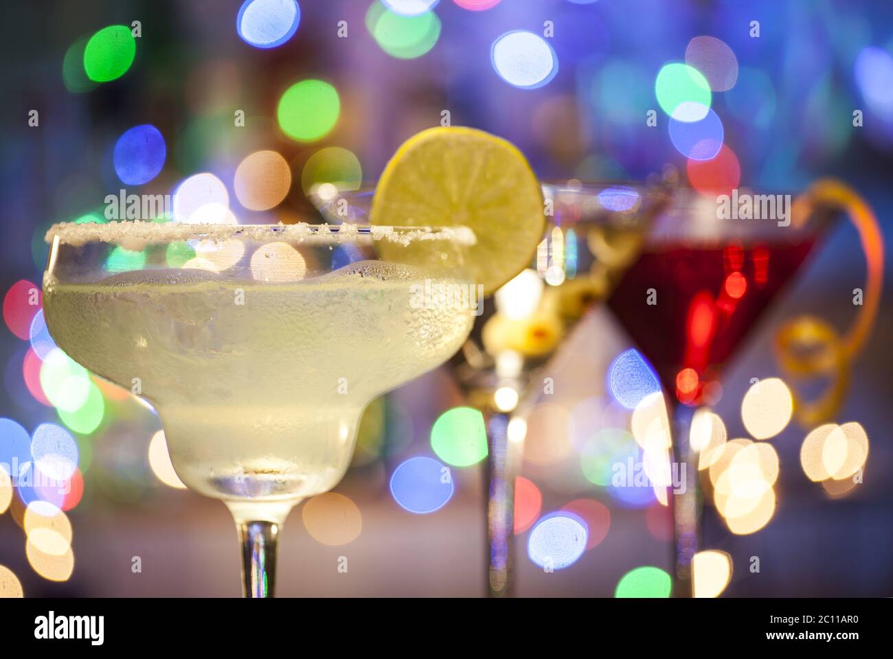 Glasses of margarita, martini and cosmopolitan cocktails Stock Photo