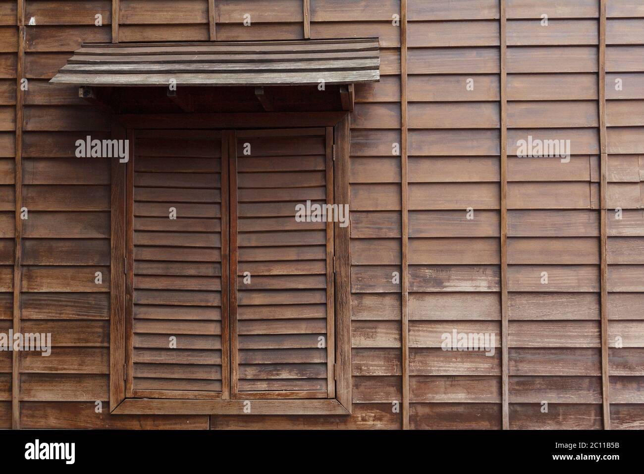 the old wall and windows make with wooden Stock Photo - Alamy