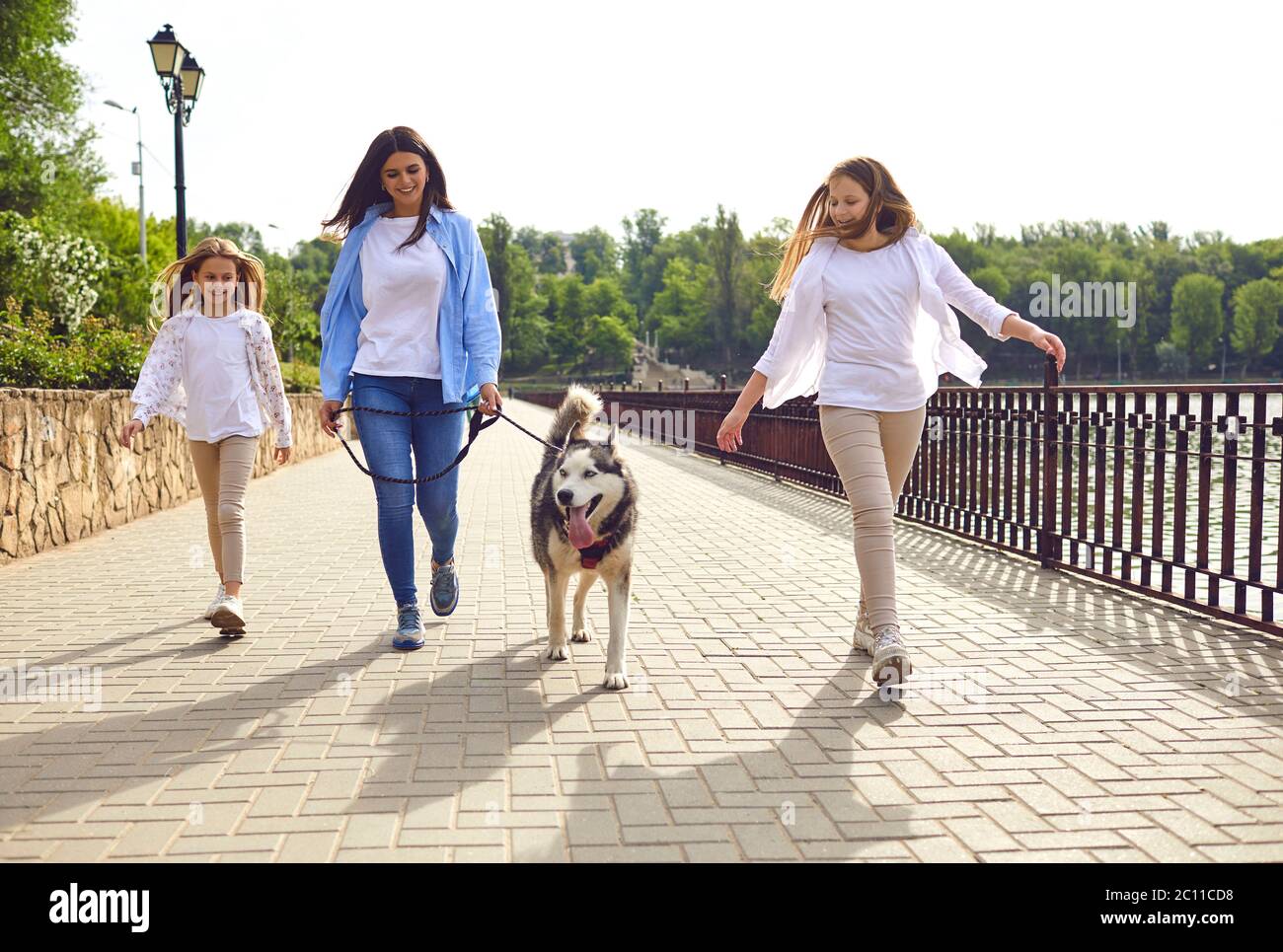 Teen girl walking dog hi-res stock photography and images - Alamy