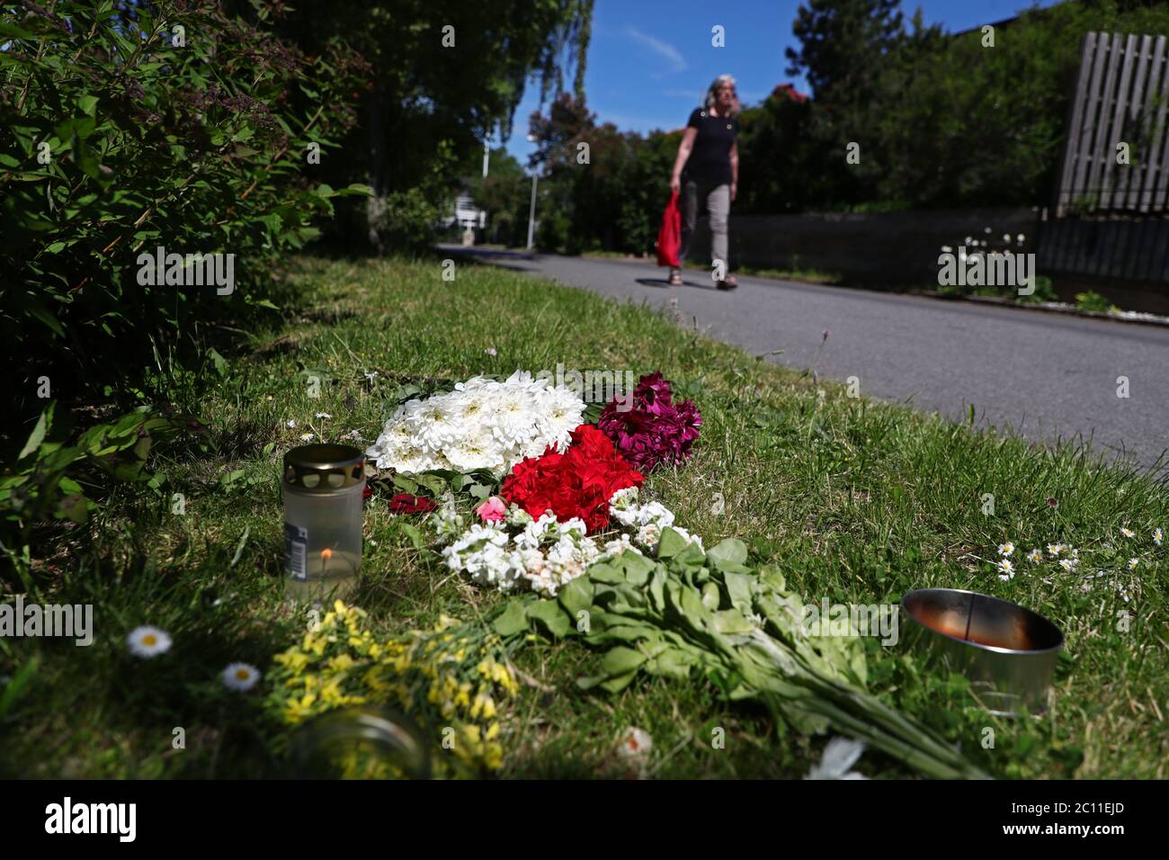 Linkoping, Sweden 20200610 Flowers and candles at the murder scene where the double murder occurred in 2004. On June 9, 2020, a suspected 37-year-old man was arrested for the double murder in Linköping in 2004, based on hits in a commercial database for DNA genealogy combined with family search. To his assistance, the police had the professional genealogist Peter Sjölund. Photo Jeppe Gustafsson Stock Photo