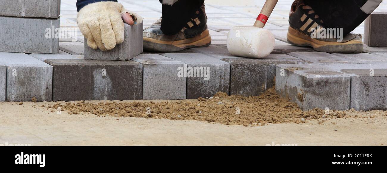 how to lay paving slabs on soil