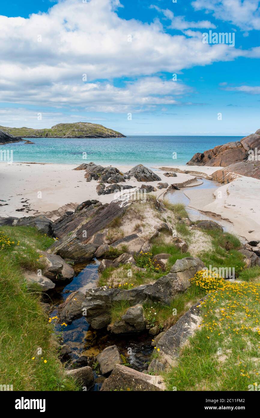 ACHMELVICH BAY AND BEACH SUTHERLAND HIGHLANDS SCOTLAND BLUE SKY WITH
