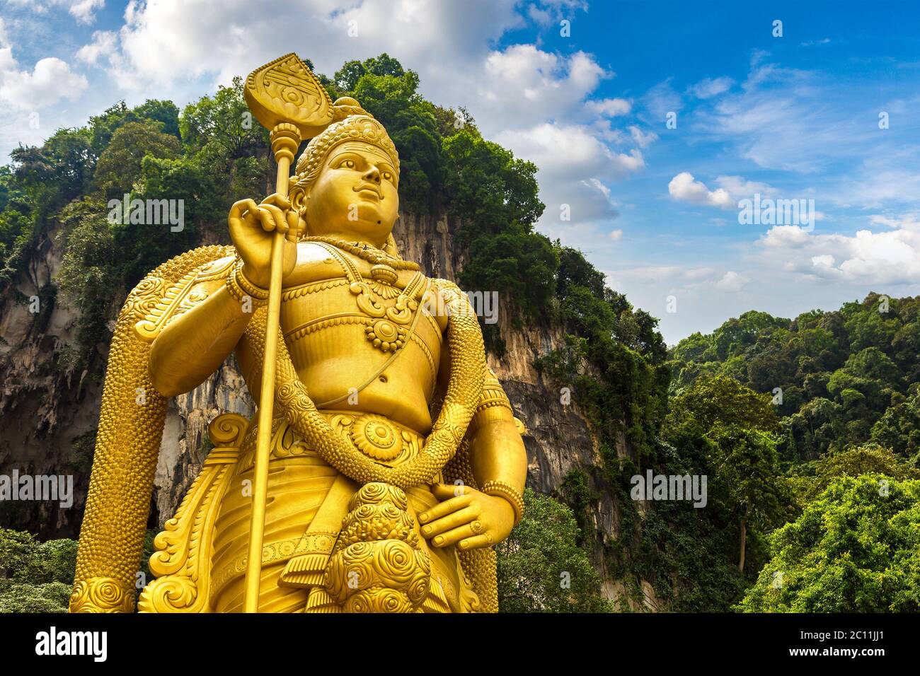 Statue of hindu god Murugan at Batu cave in Kuala Lumpur, Malaysia at  summer day Stock Photo - Alamy
