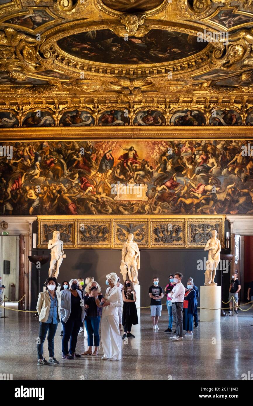 VENICE, ITALY - JUNE 13, 2020: Tourists visit the Ducale Palace Museum the day of the reopening after more than 3 months of closure due to the lockdown for Covid-19 on June 13, 2020 in Venice, Italy. Stock Photo