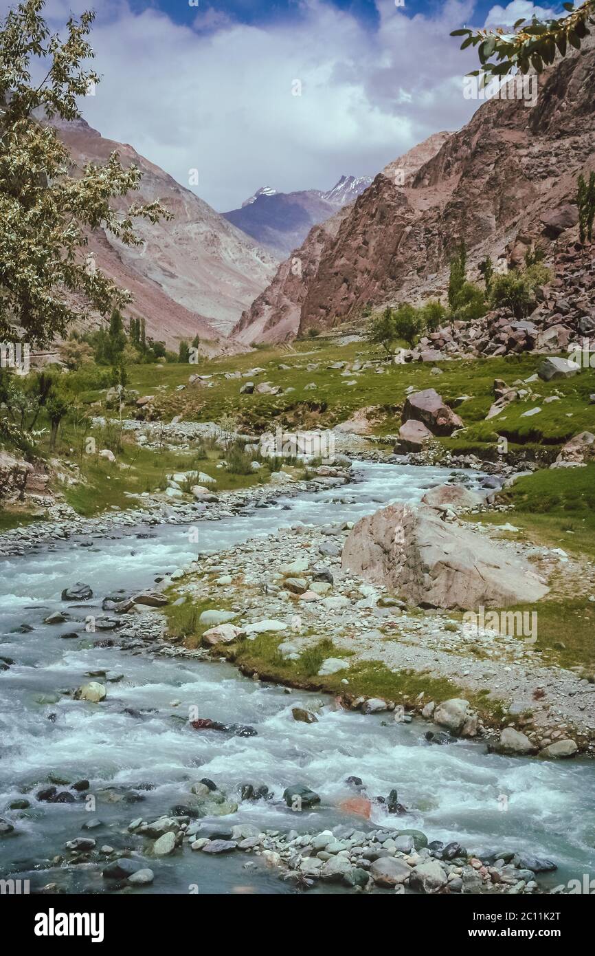 Stream crossing green meadow hi-res stock photography and images - Alamy