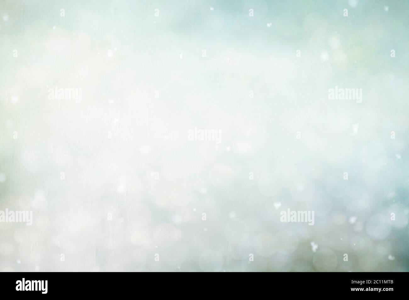 Snow falling and floating on the air, wintry xmas abstract background Stock Photo