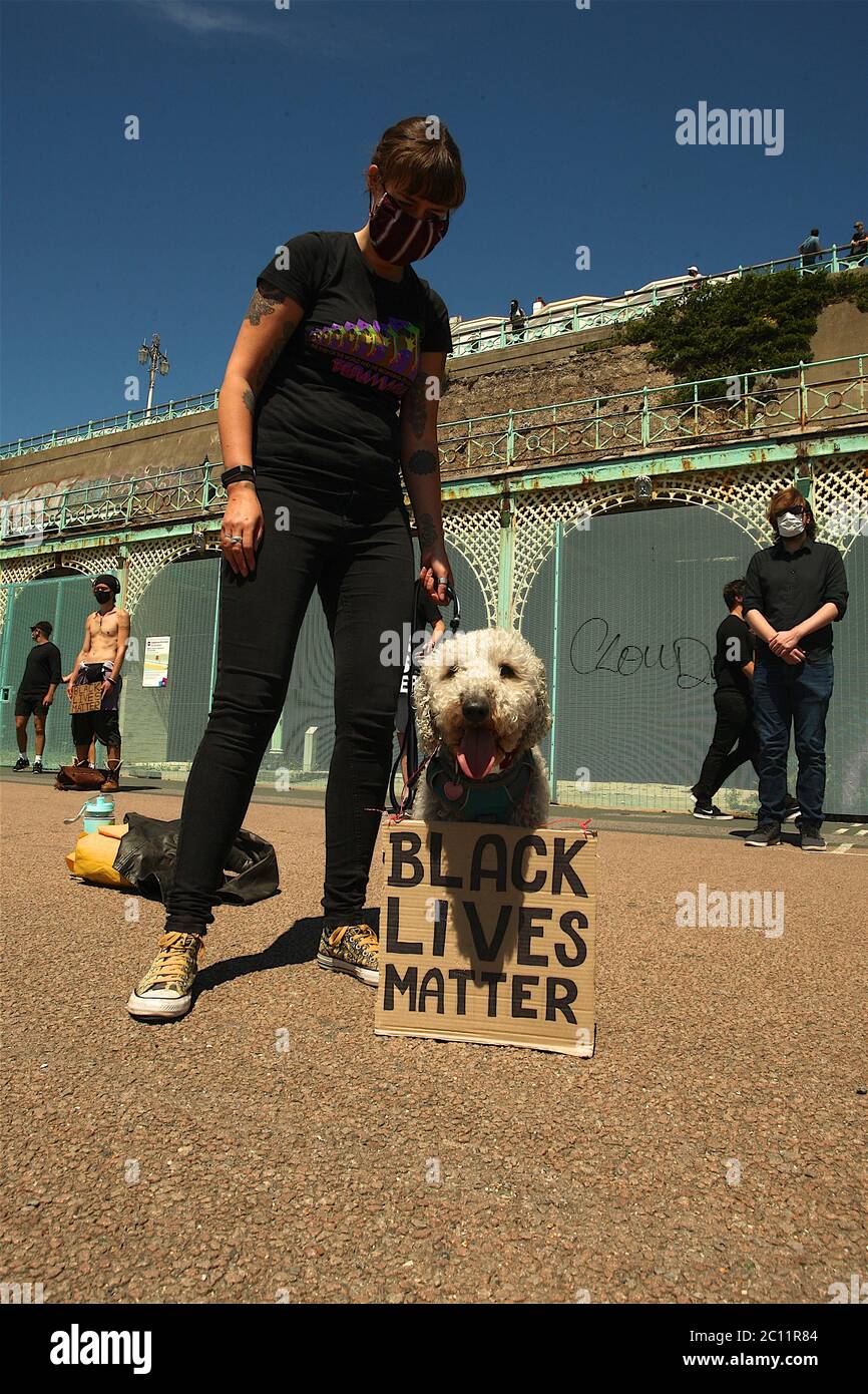 The Black Lives Matter Silent Protest on Madeira Drive on Brighton Seafront followed by a march through the City. Stock Photo