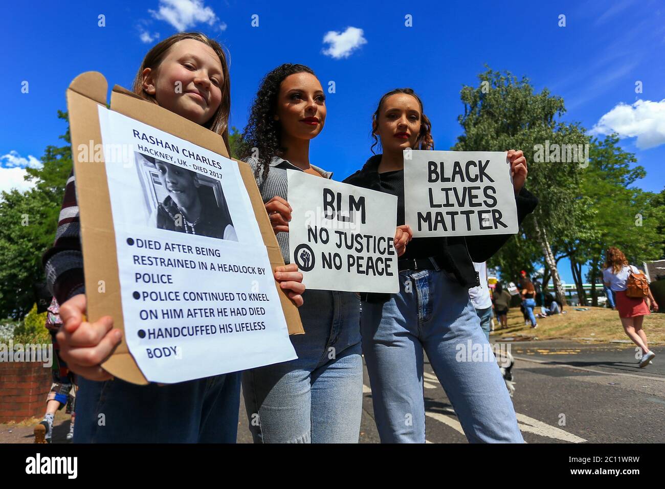 Stourbridge, West Midlands, UK. 13th June, 2020. A lively but peaceful gathering of at least 200 people demonstrated for the Black Lives Matter in the town of Stourbridge, West Midlands, UK. Credit: Peter Lopeman/Alamy Live News Stock Photo