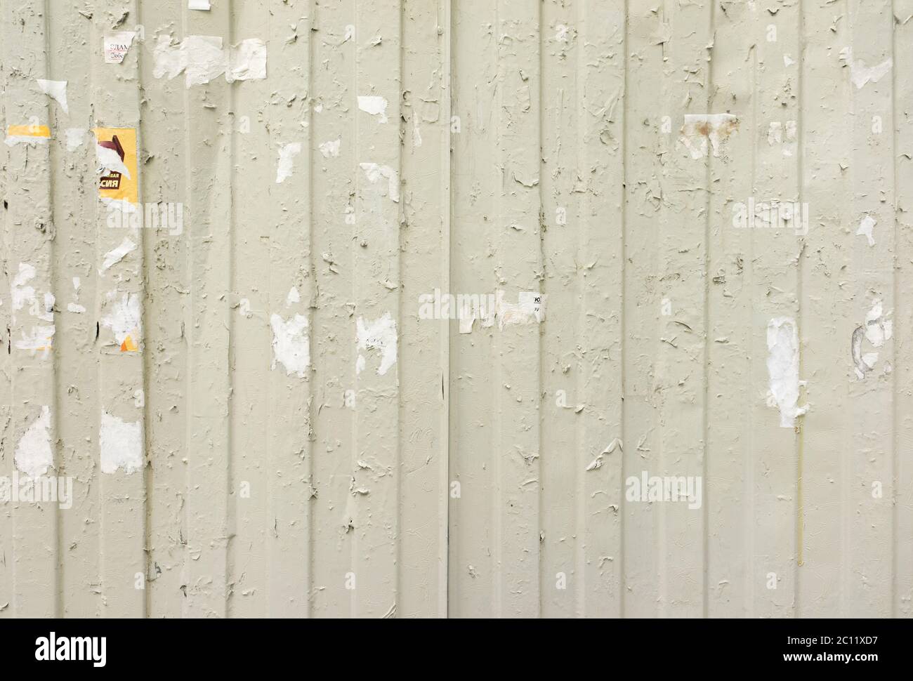 Torn Posters On Grunge Old Walls Stock Photo