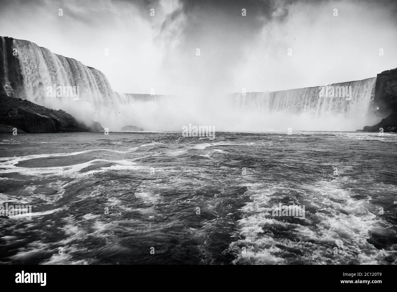 The rapids in the Niagara River during a cloudy day, Niagara Falls, Ontario, Canada Stock Photo