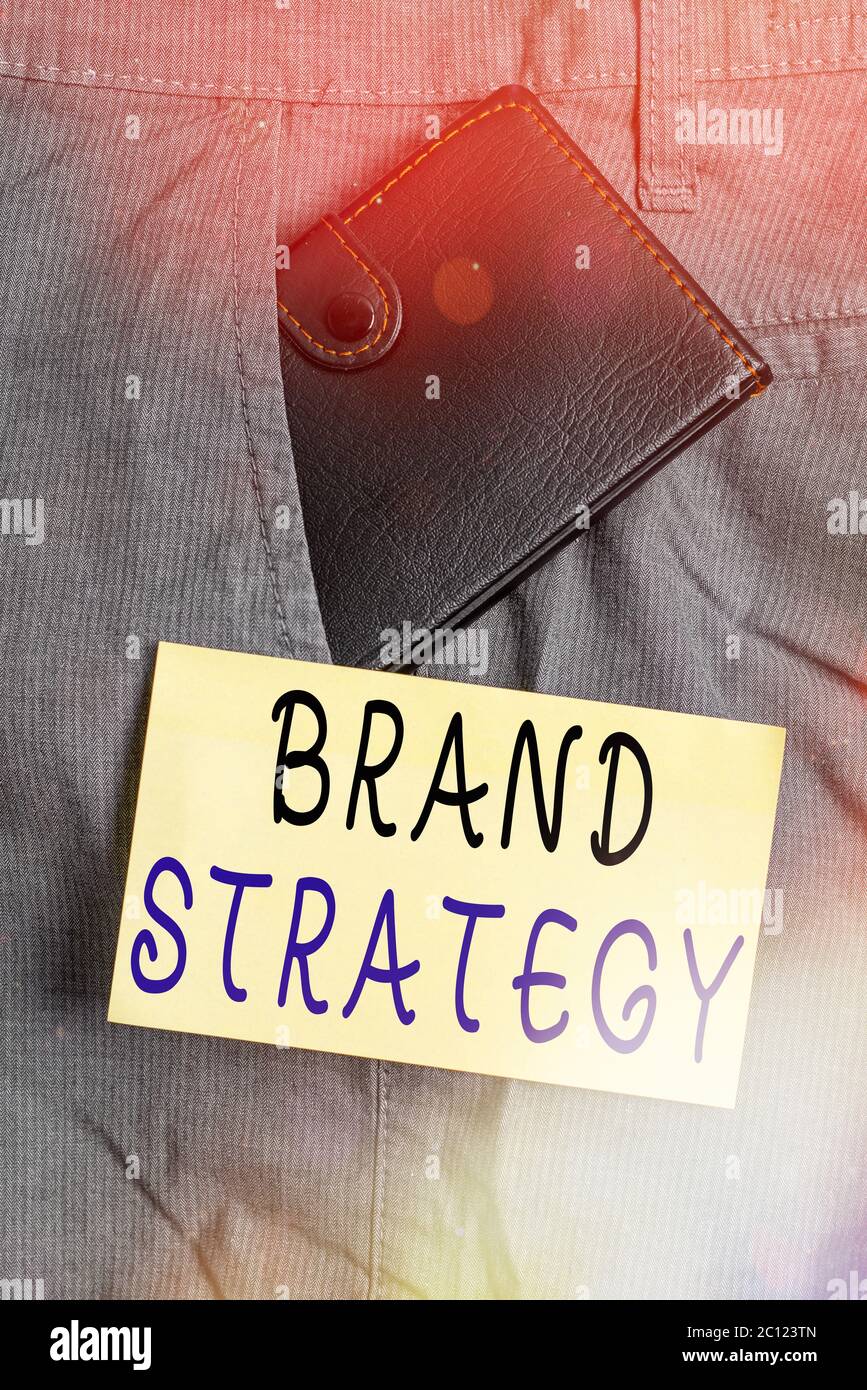 Writing note showing Brand Strategy. Business concept for longterm plan ...