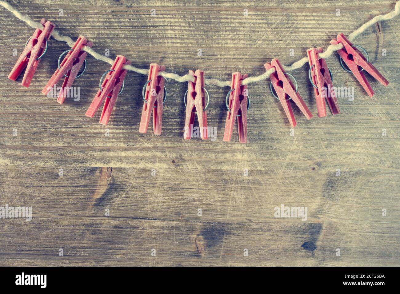 Old clothespins on rope Stock Photo Alamy