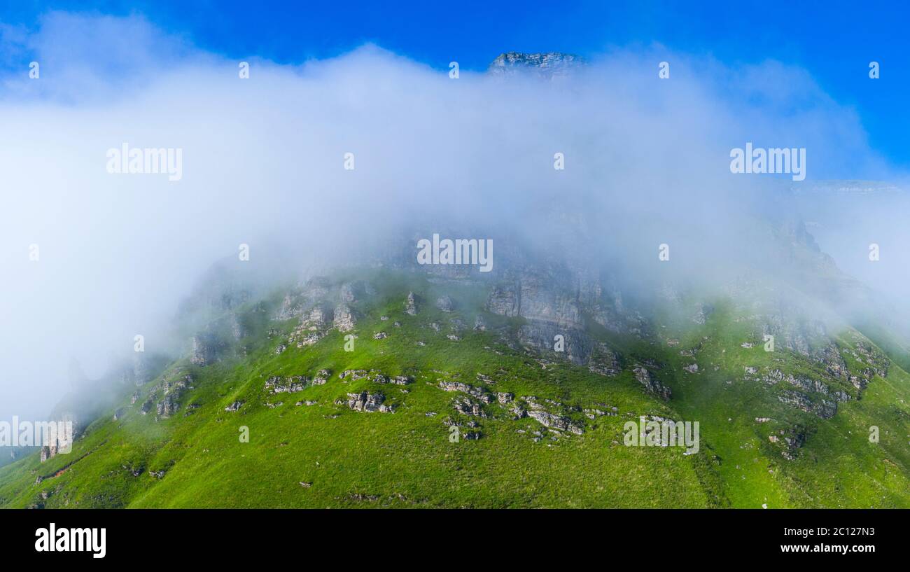 Spring landscape of mountains and meadows near the Portillo de Lunada in the Valle del Miera, Cantabria, Spain, Europe Stock Photo