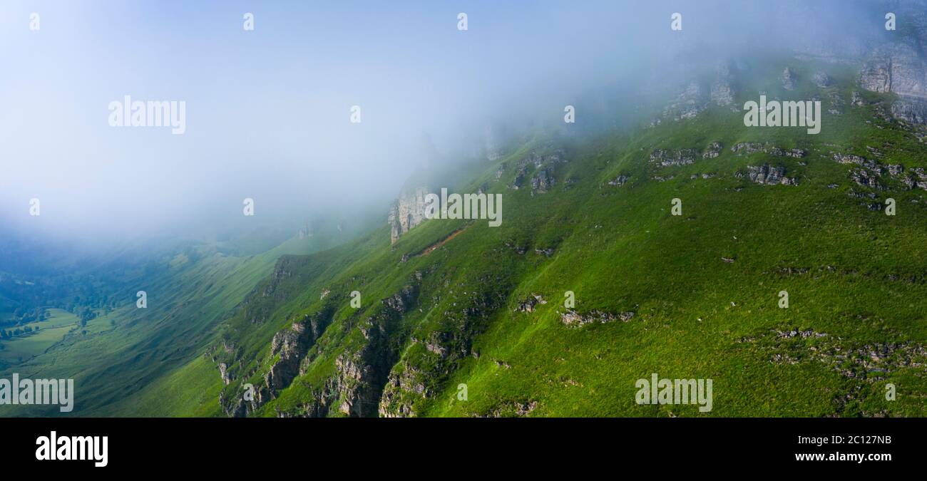 Spring landscape of mountains and meadows near the Portillo de Lunada in the Valle del Miera, Cantabria, Spain, Europe Stock Photo