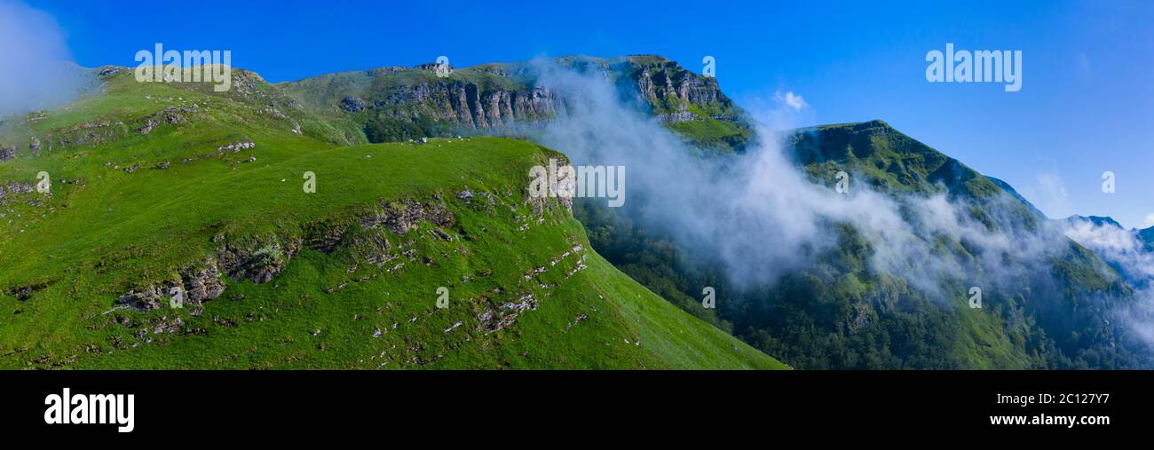 Spring landscape of mountains and meadows near the Portillo de Lunada in the Valle del Miera, Cantabria, Spain, Europe Stock Photo