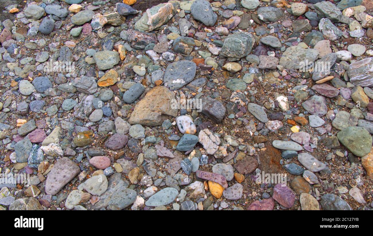 textural-backgrounds-of-beach-pebbles-rocks-and-sand-along-the-strand