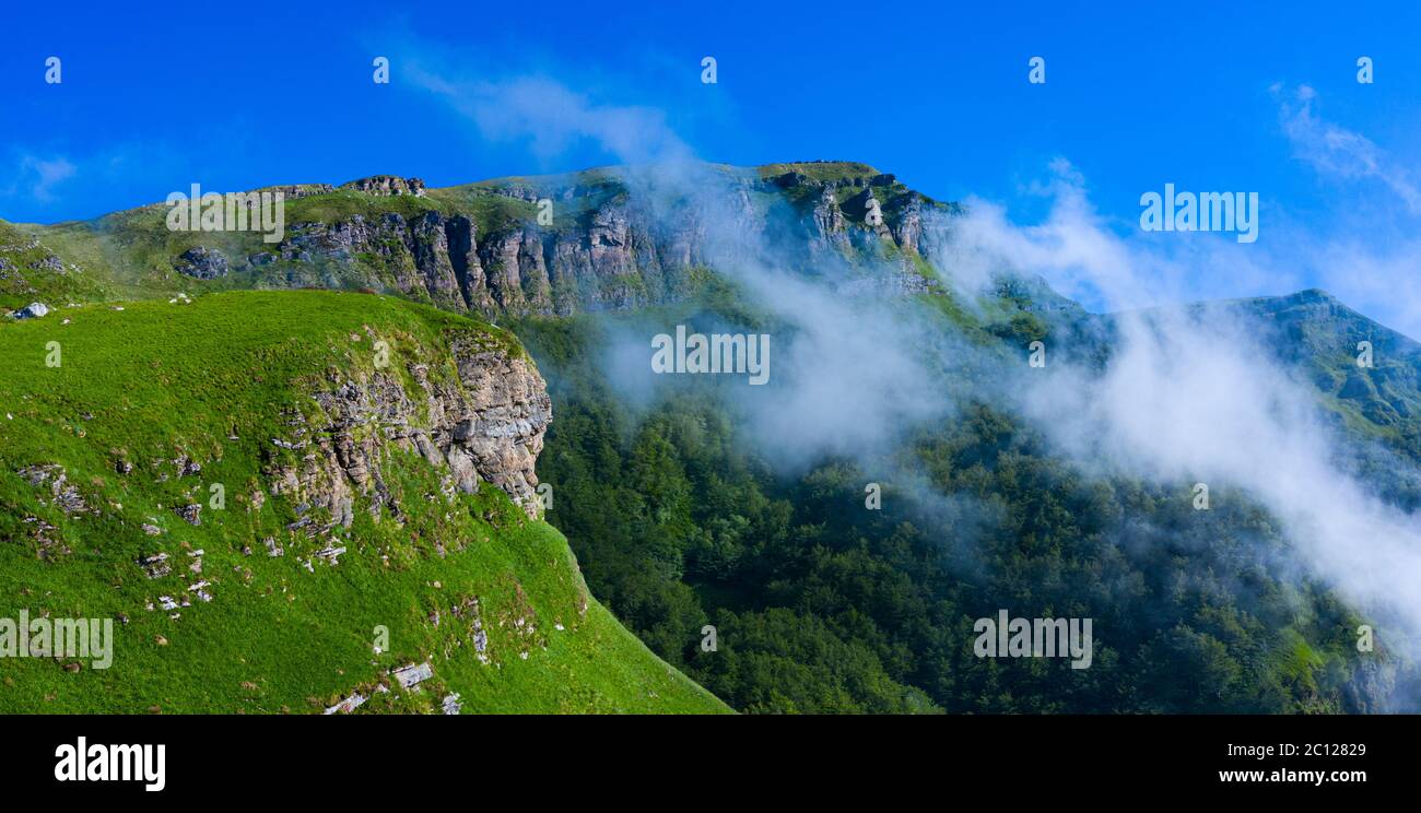 Spring landscape of mountains and meadows near the Portillo de Lunada in the Valle del Miera, Cantabria, Spain, Europe Stock Photo