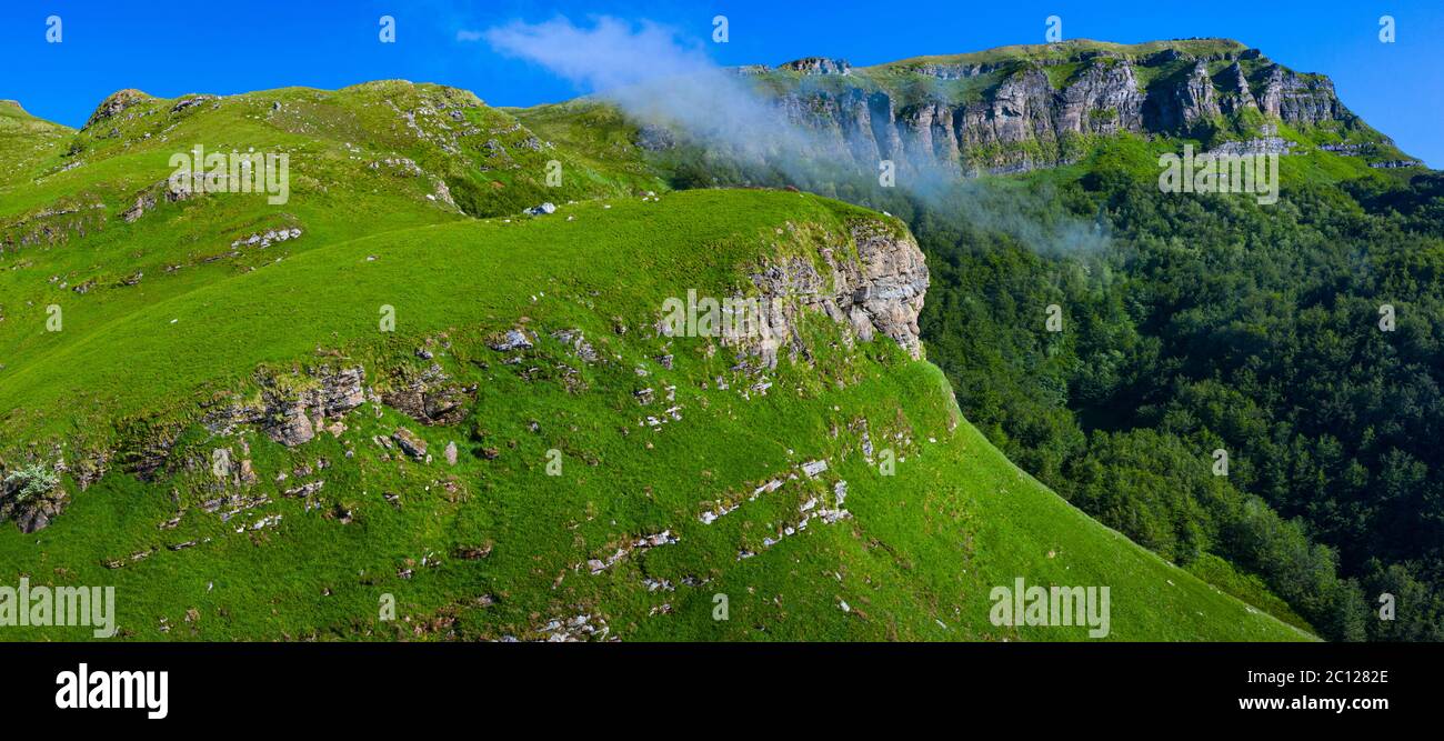 Spring landscape of mountains and meadows near the Portillo de Lunada in the Valle del Miera, Cantabria, Spain, Europe Stock Photo