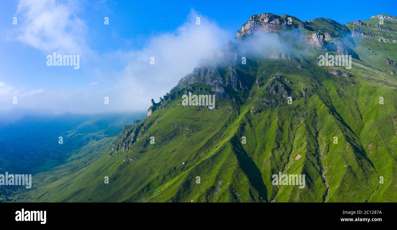 Spring landscape of mountains and meadows near the Portillo de Lunada in the Valle del Miera, Cantabria, Spain, Europe Stock Photo