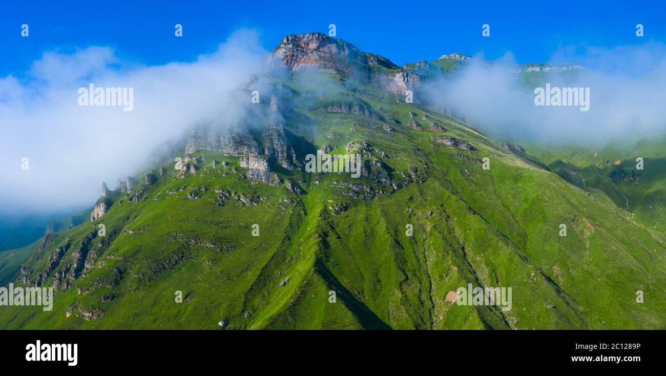 Spring landscape of mountains and meadows near the Portillo de Lunada in the Valle del Miera, Cantabria, Spain, Europe Stock Photo